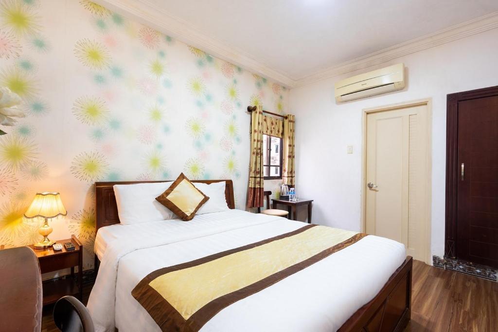 Cosmo Central Hotel Ho Chi Minh Buitenkant foto