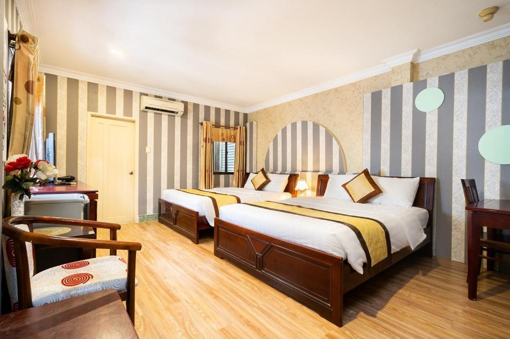 Cosmo Central Hotel Ho Chi Minh Buitenkant foto