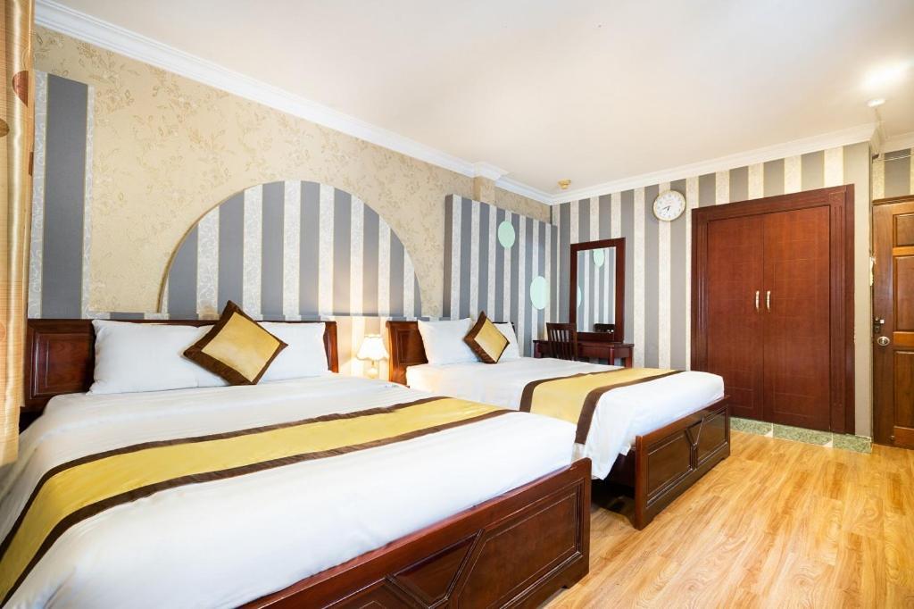 Cosmo Central Hotel Ho Chi Minh Buitenkant foto