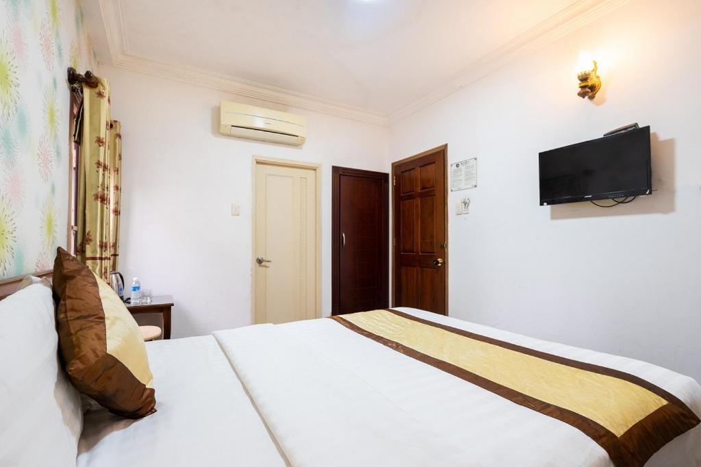 Cosmo Central Hotel Ho Chi Minh Buitenkant foto