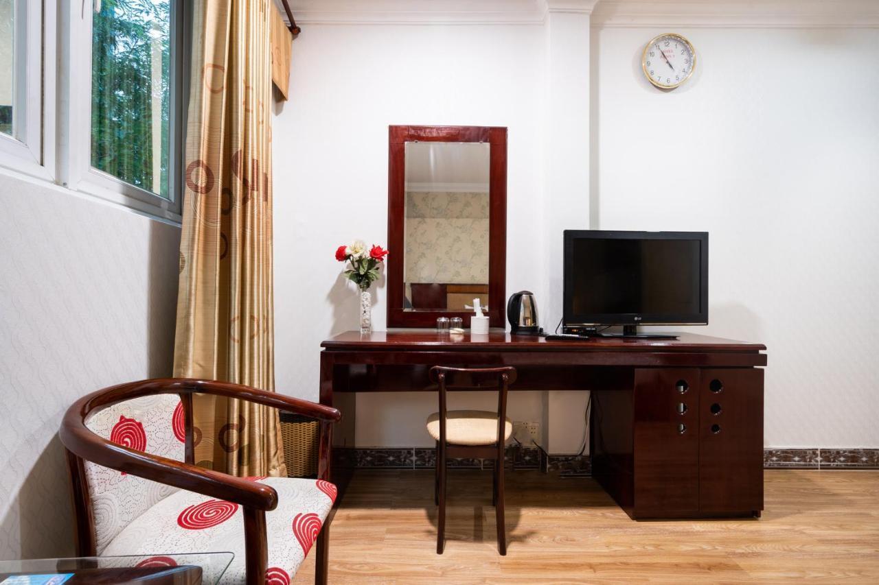 Cosmo Central Hotel Ho Chi Minh Buitenkant foto