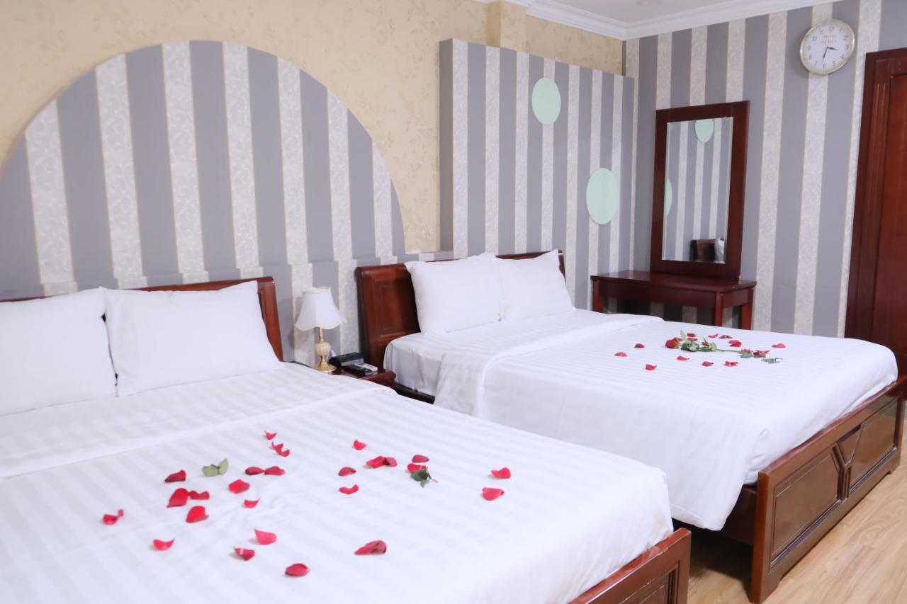 Cosmo Central Hotel Ho Chi Minh Buitenkant foto