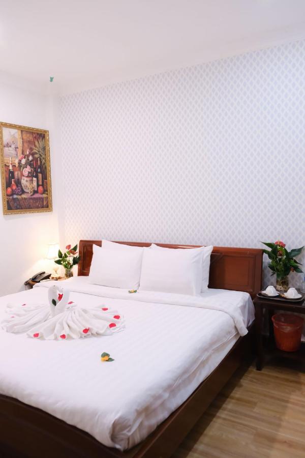 Cosmo Central Hotel Ho Chi Minh Buitenkant foto