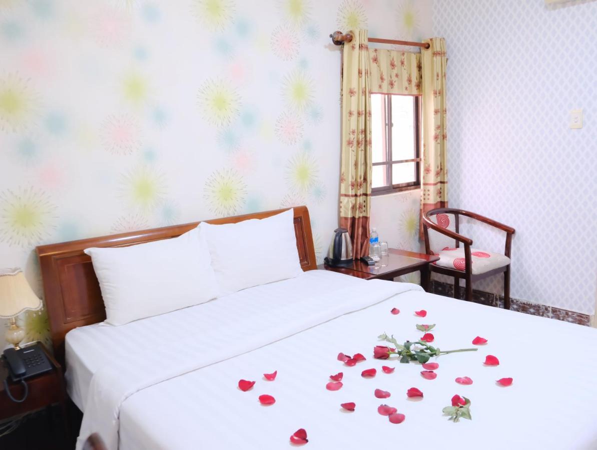 Cosmo Central Hotel Ho Chi Minh Buitenkant foto