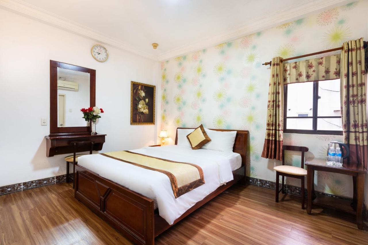 Cosmo Central Hotel Ho Chi Minh Buitenkant foto