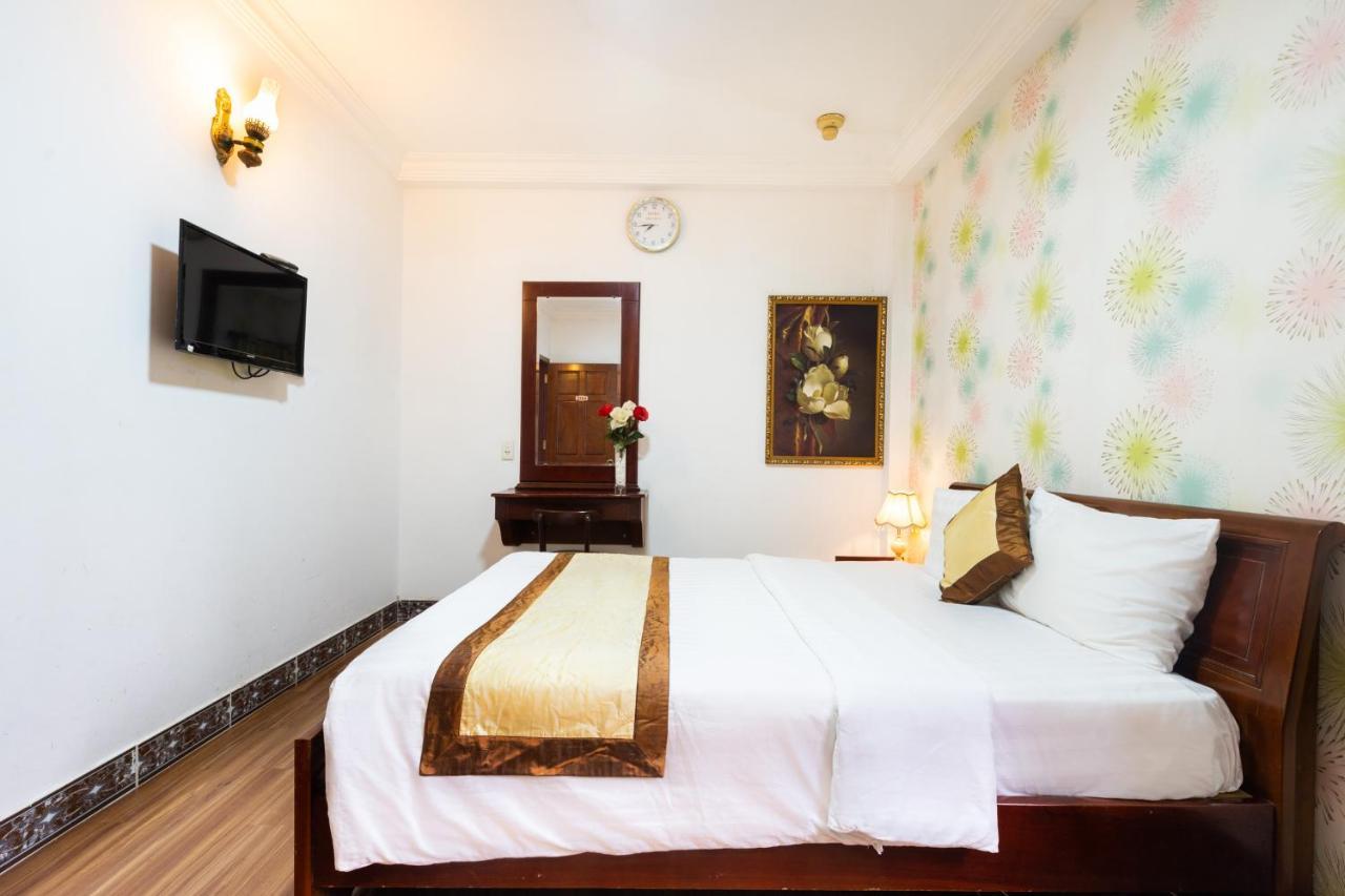 Cosmo Central Hotel Ho Chi Minh Buitenkant foto
