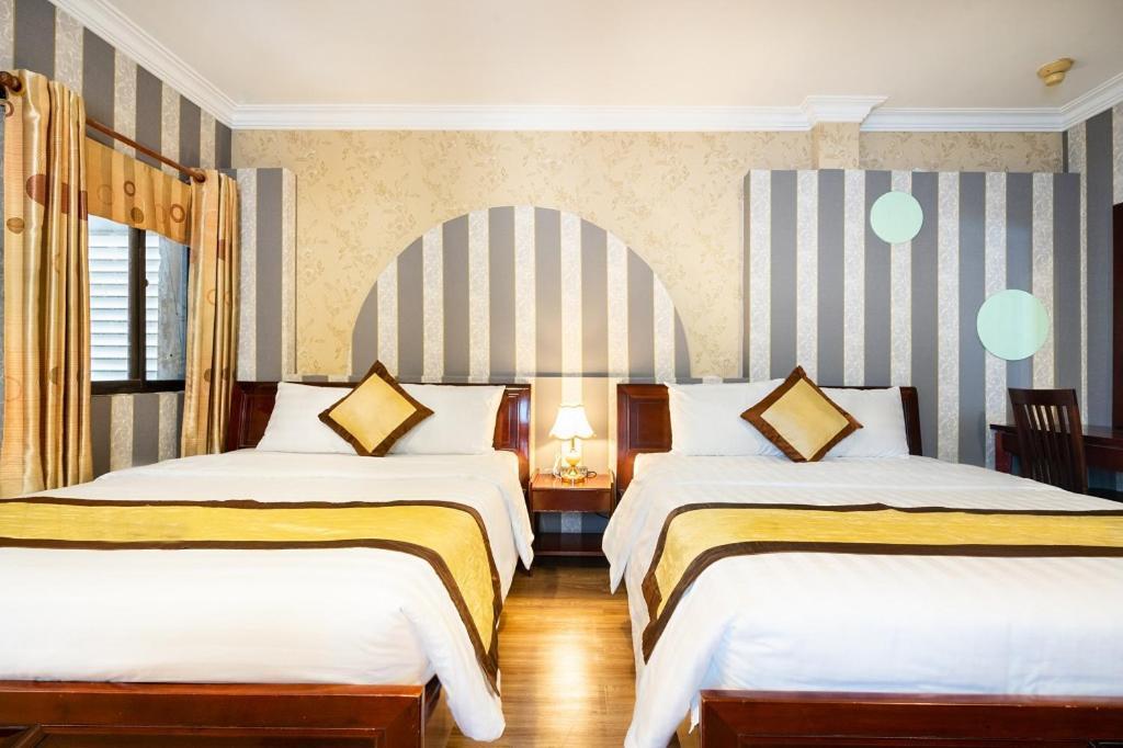 Cosmo Central Hotel Ho Chi Minh Buitenkant foto