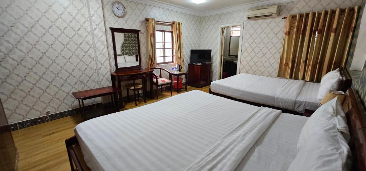 Cosmo Central Hotel Ho Chi Minh Buitenkant foto
