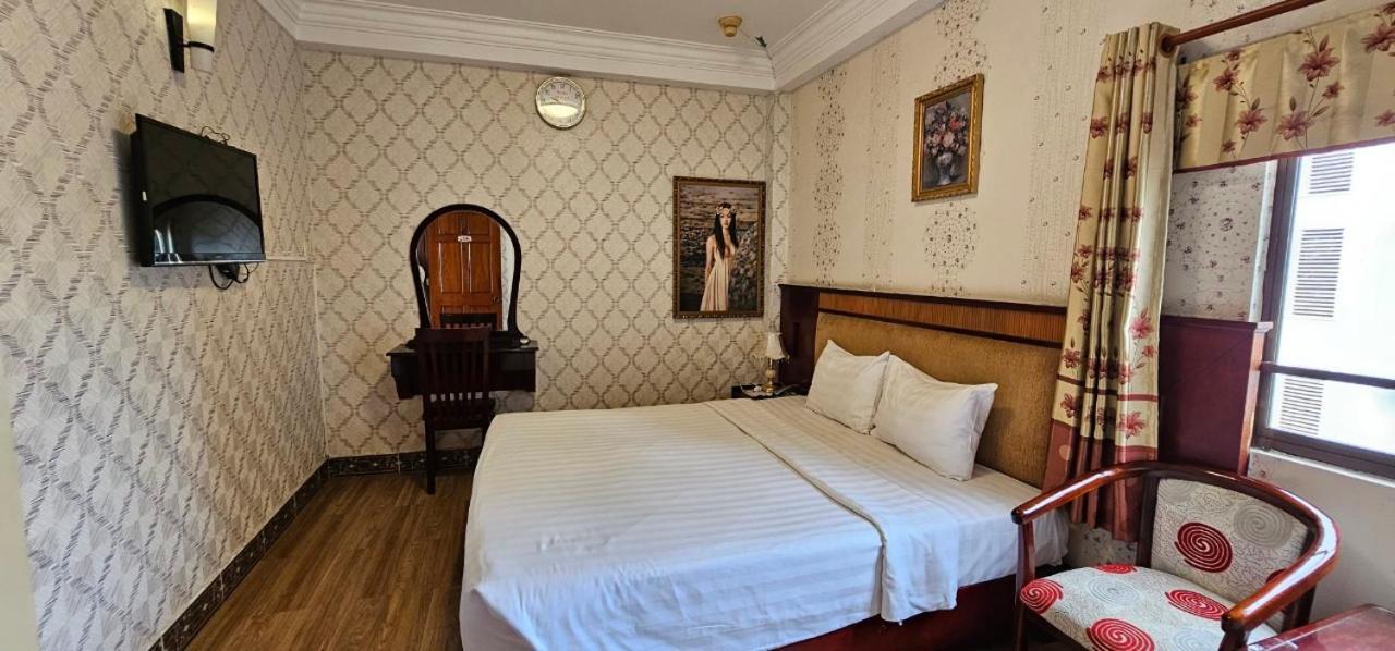 Cosmo Central Hotel Ho Chi Minh Buitenkant foto