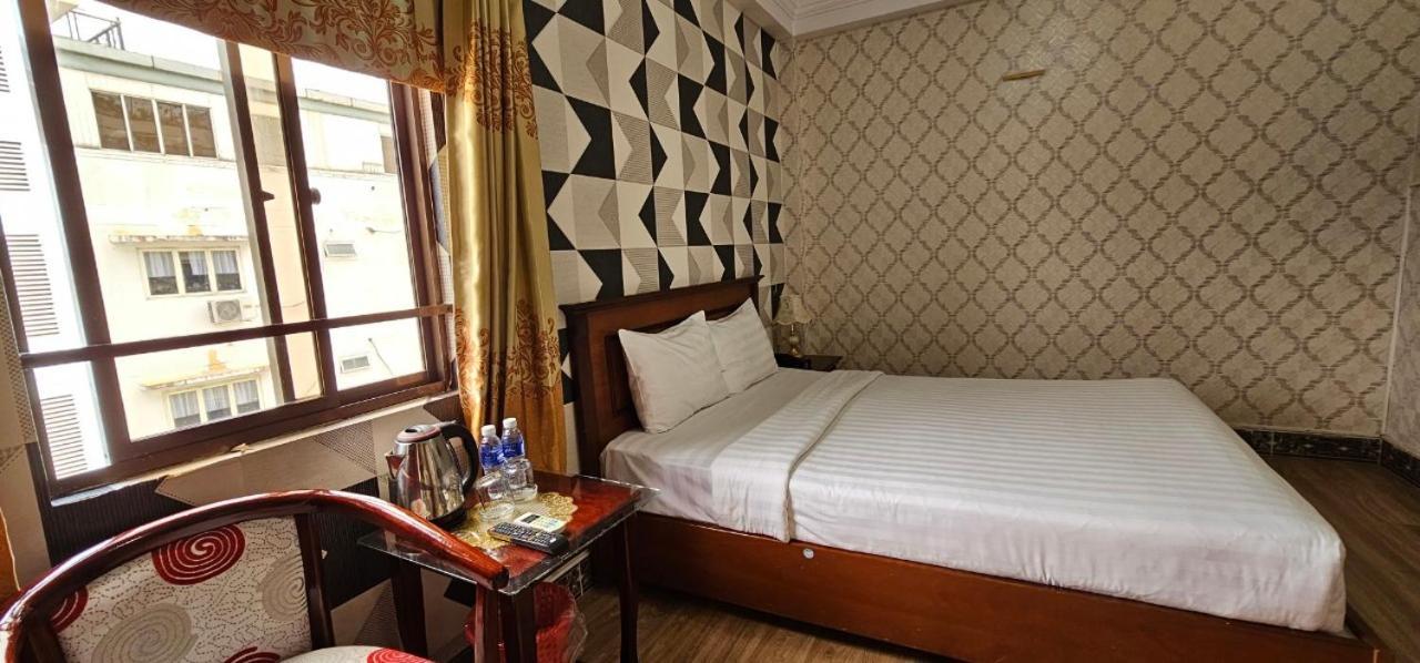 Cosmo Central Hotel Ho Chi Minh Buitenkant foto
