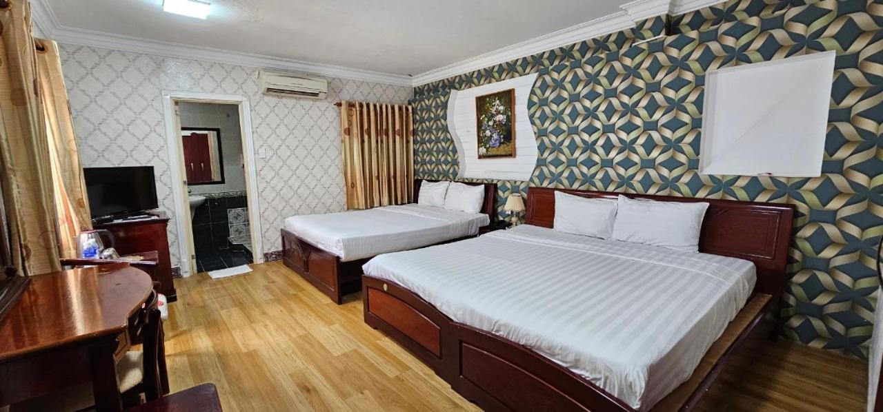 Cosmo Central Hotel Ho Chi Minh Buitenkant foto